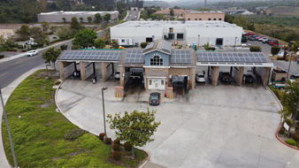 commercial solar panels on top of car dealership