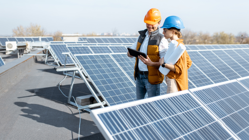two commercial solar panel installers in orange county doing maintenance